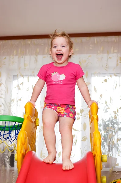 Child girl on slide — Stock Photo, Image