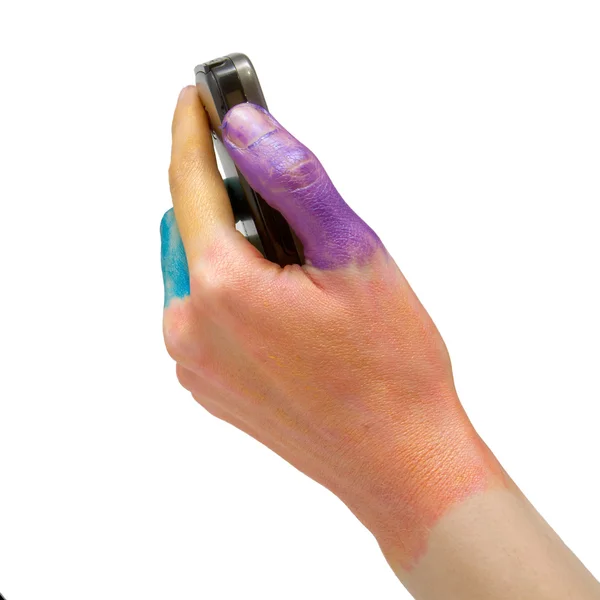 Colored hand holding telephone. — Stock Photo, Image