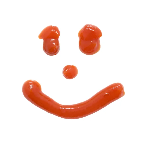 Символ улыбки, нарисованный кетчупом — стоковое фото