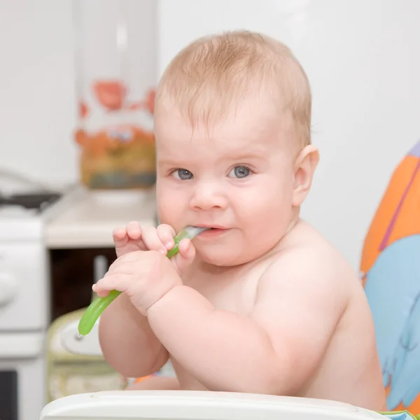 Baby eating vegetable mash — Stock Photo, Image