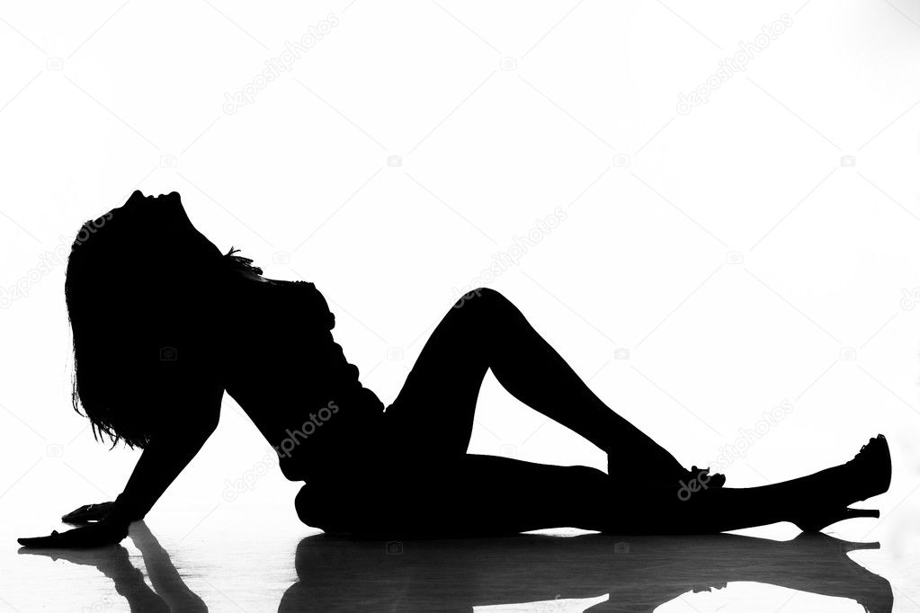 Silhouette of lying sexy woman as logo. Isolated on white background with clipping path