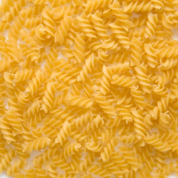 Closeup rotini Těstoviny nevařené italské spirála — Stock fotografie