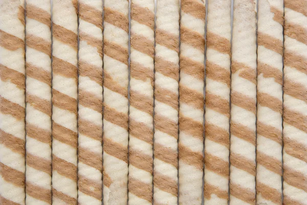 Närbild av randiga wafer rullar — Stockfoto
