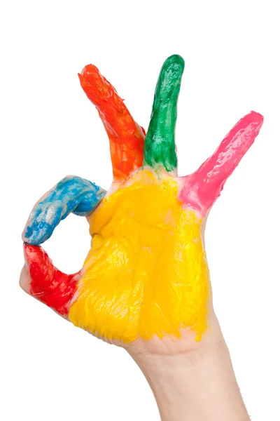 Färgade hand visar ok gest — Stockfoto