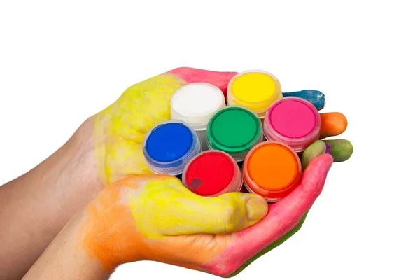 Barevné ruce drží sady barev — Stock fotografie