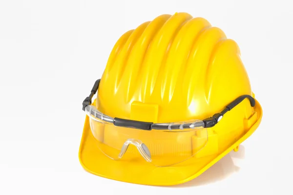 Yellow helmet isolated and glasses — Stock Photo, Image