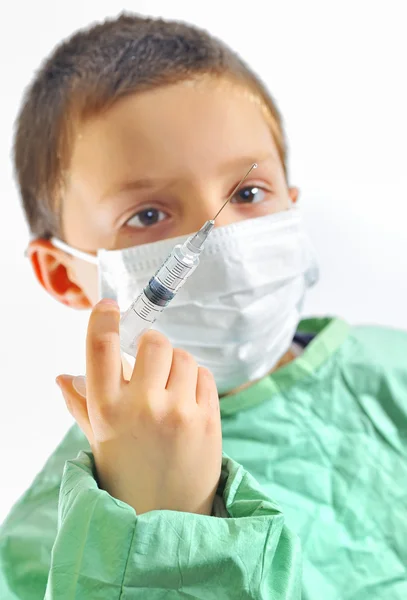 stock image Doctor boy with protective mask preparing to inject