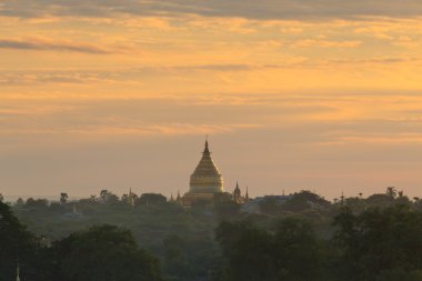 Shwezigon pagoda at sunrise,Bagan, Myanmar clipart