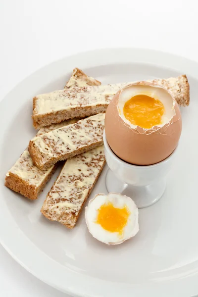 Boiled egg and toast soldiers — Stock Photo, Image