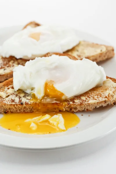 Poached eggs on toast — Stock Photo, Image