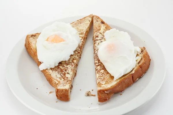 Poached egg on toast — Stock Photo, Image