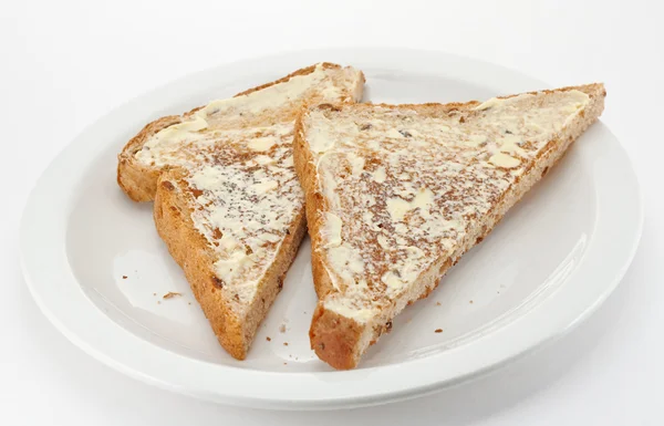 バターを塗ったトースト三角形 — ストック写真