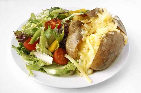 Cheese Jacket Potato with side salad — Stock Photo, Image