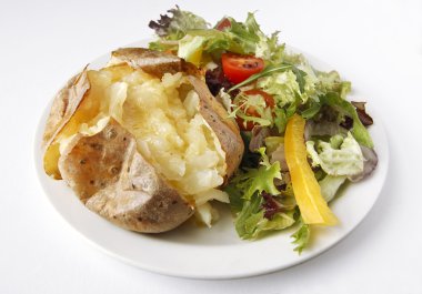 Plain Butter Jacket Potato with side salad clipart