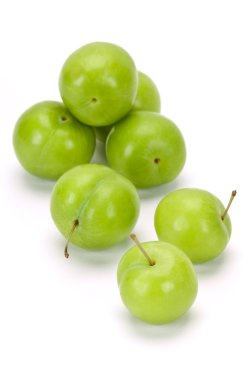 Green plums on white clipart