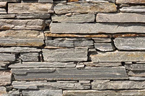 Parede de tijolo de pedra cinza — Fotografia de Stock