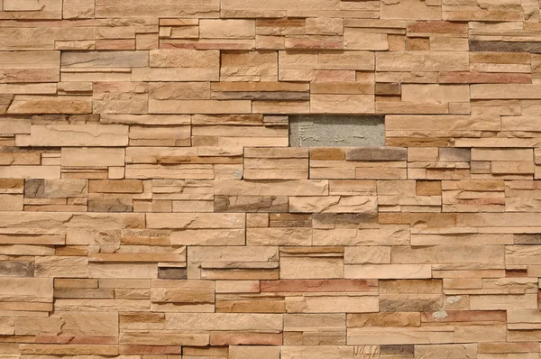 Parede moderna faltando um tijolo — Fotografia de Stock