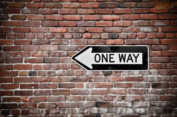 Brick Wall with One Way Sign — Stock Photo, Image