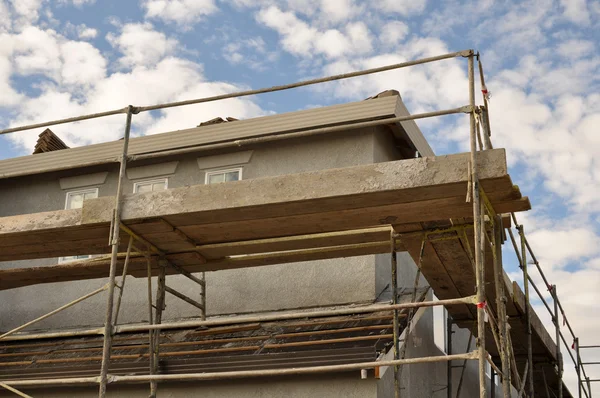 New Home Under Construction with Scaffolding — Stock Photo, Image
