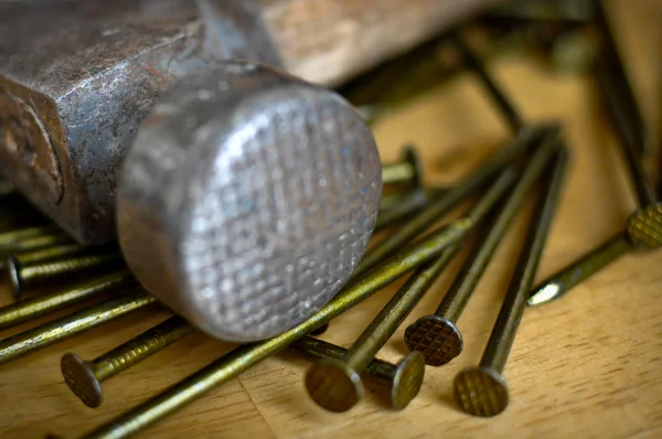 Hammer and Nails on Wood — Stock Photo, Image
