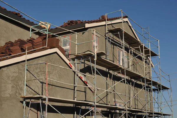 Construção de casa moderna de estuque — Fotografia de Stock