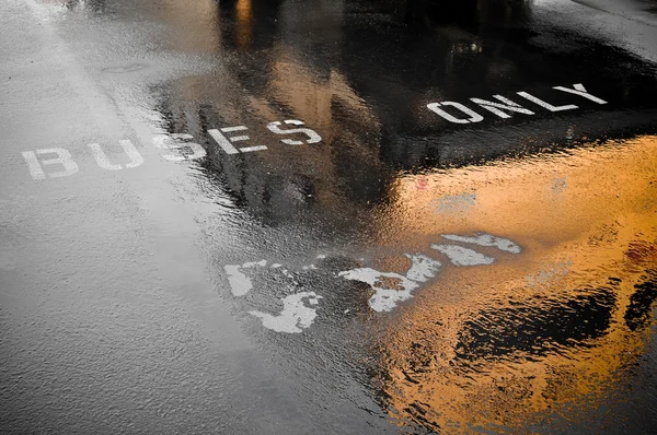 stock image Buses Only Parking Spot to pick up children after rainy day