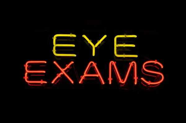 Stock image Eye Exams Neon Yellow and Pink Sign