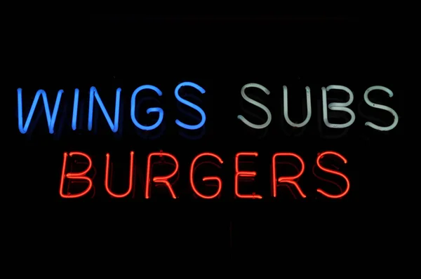 Wings Subs Burgers Sign — Stock Photo, Image