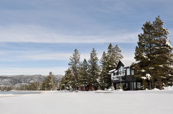 stock image Cabin in Snow with Mountains in Background