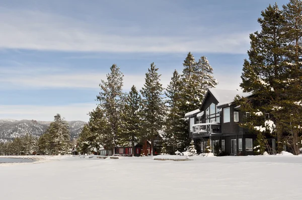 stock image Cabin in Snow with Mountains in Background