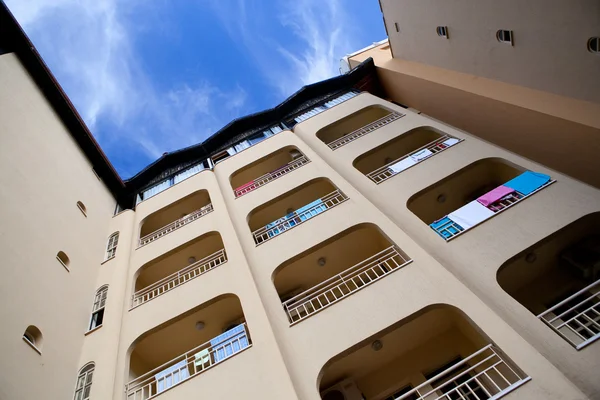 Hotel with balcons Stockafbeelding