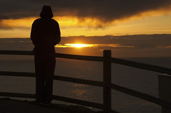 Silhouette on a sunset Stock Photo