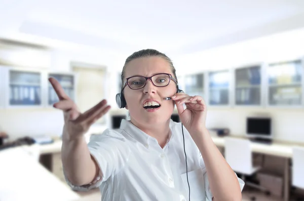 stock image Blondy beautiful girl speaking over the headset