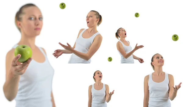 Healthy blondy happy woman plays and looks apples — Stock Photo, Image
