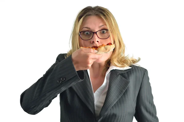 Üzletasszony elszigetelt fehér background pizzát eszik — Stock Fotó