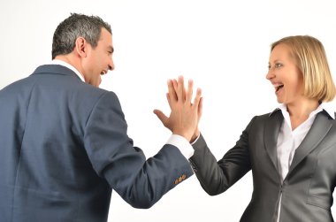 Young business colleagues giving each other a high five isolated clipart