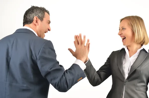 Young business colleagues giving each other a high five isolated — Stock Photo, Image