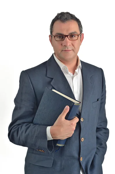 Podnikatel drží knihu izolovaných na bílém pozadí — Stock fotografie