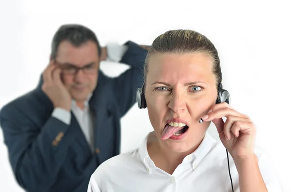 Biznes kobieta z zestawem słuchawkowym i rozmowy z businessm — Zdjęcie stockowe
