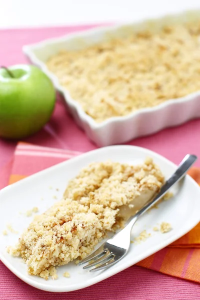 stock image Delicious green apple crumble served on white plate