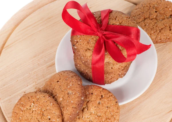 Soubory cookie s červenou stužku — Stock fotografie