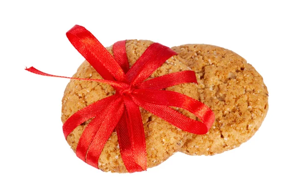 A cookie-k kötött piros szalaggal — Stock Fotó