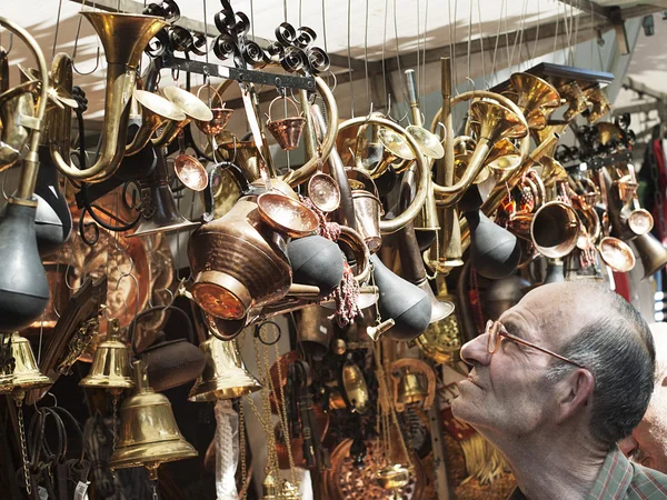 stock image Men looking goldsmithing stuff