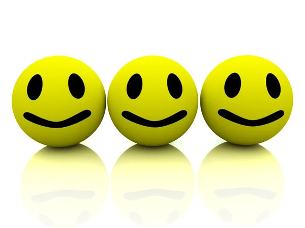 3-е желтые улыбающиеся лица — стоковое фото