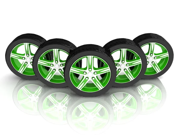 5 черных и зеленых колес — стоковое фото
