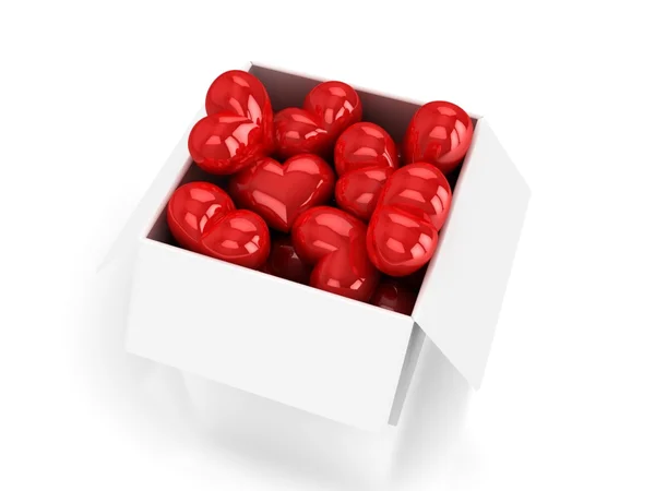 Rode harten in witte doos — Stockfoto
