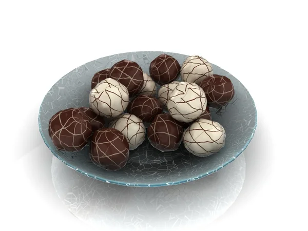 Chocolate candies on a plate — Stock Photo, Image