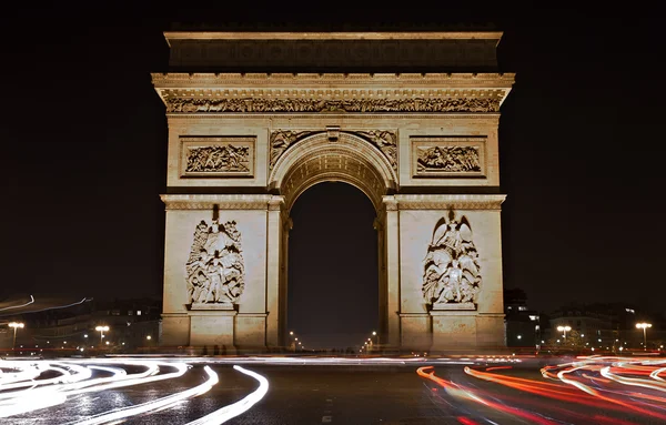 Illuminated Arc de Triomphe at night — Stock Photo, Image
