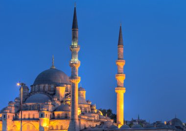 Yeni Valide Camii during the blue hour clipart