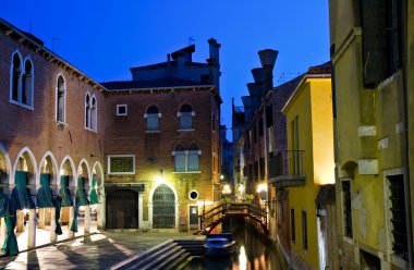 A small channel in San Polo at the blue hour clipart